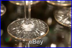 Saint Louis, série de 8 verres à vin cristal et or à décor gravé de rinceaux