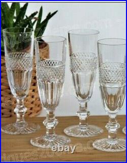 Série de 4 flûtes à champagne en cristal Saint Louis modèle Trianon